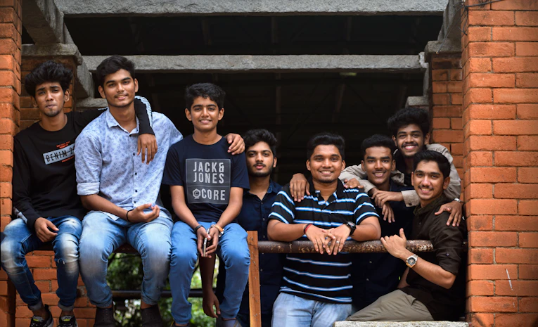 Smiling group of students together, representing freshers week