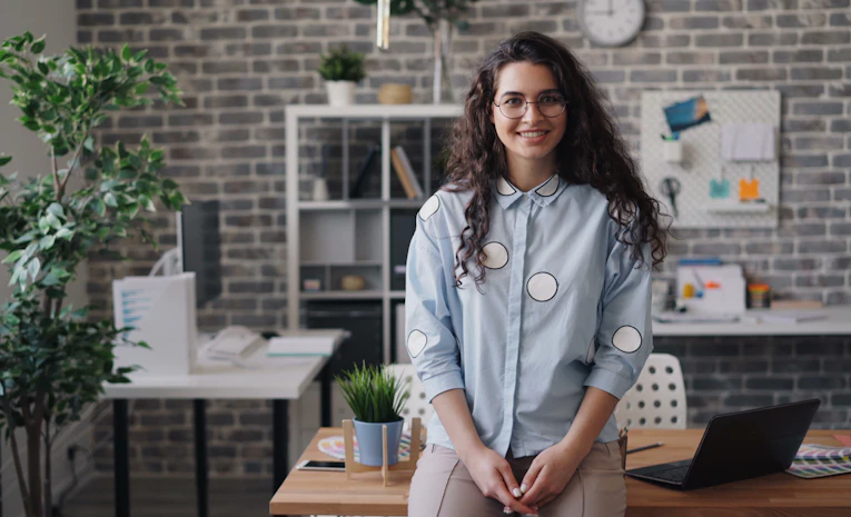 Young professional working at a desk, representing internships in the UK