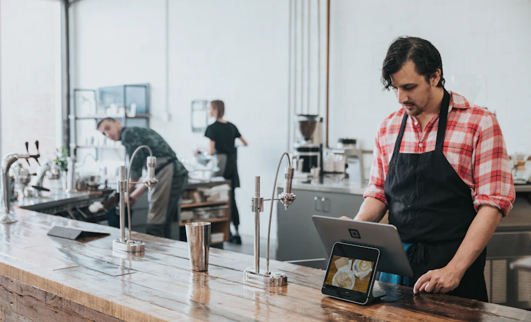 Barista working in a cafe, representing a student part-time job